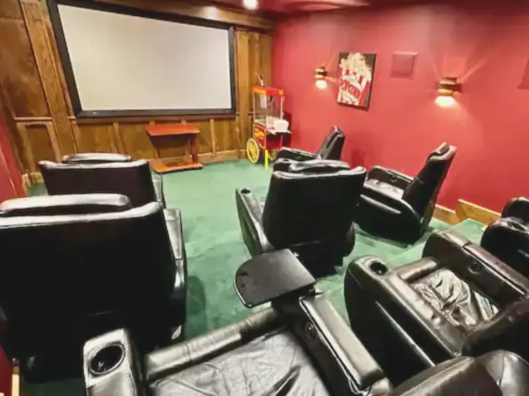 Cozy theater room with recliners in Salem, CT Airbnb.