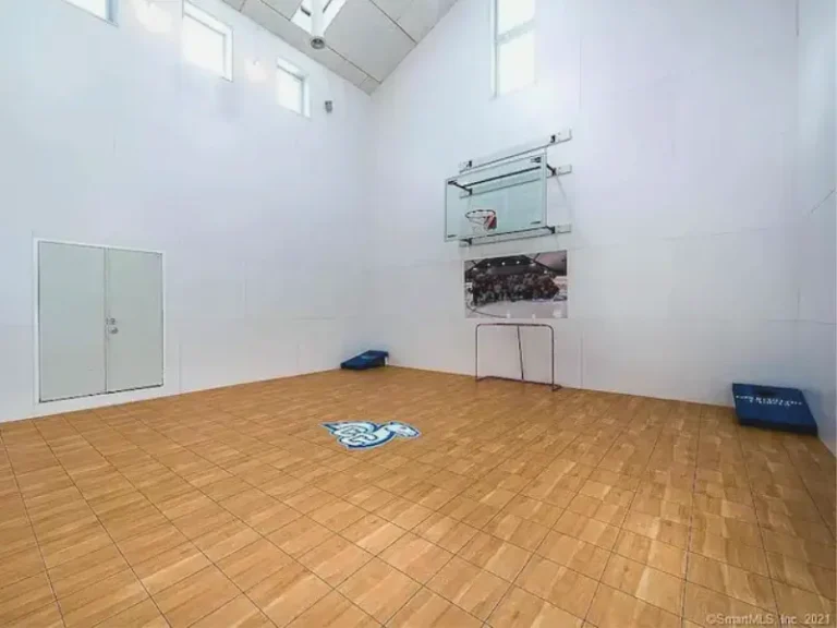 Indoor basketball court with high ceilings in Waterford, CT Airbnb.