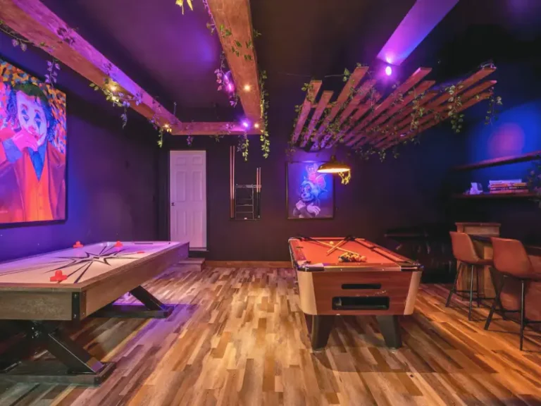 Vibrant game room with pool table and bar at a Tobyhanna, PA vacation rentals with indoor pool.