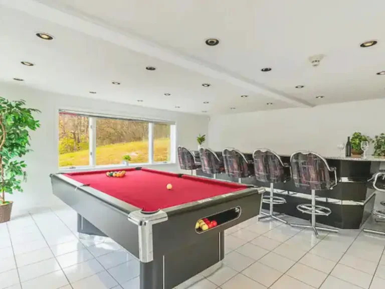 Bright game room with a pool table in Narrowsburg, NY Airbnb.