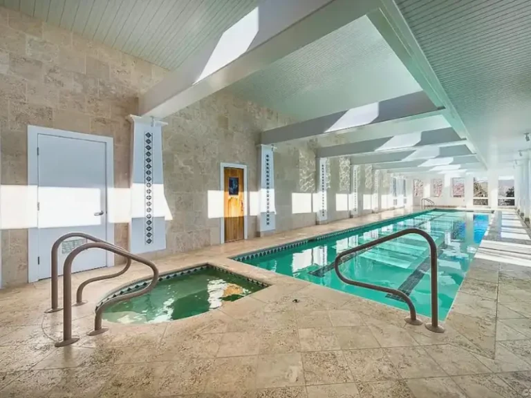 Long indoor pool with a hot tub in Waterford, CT Airbnb.
