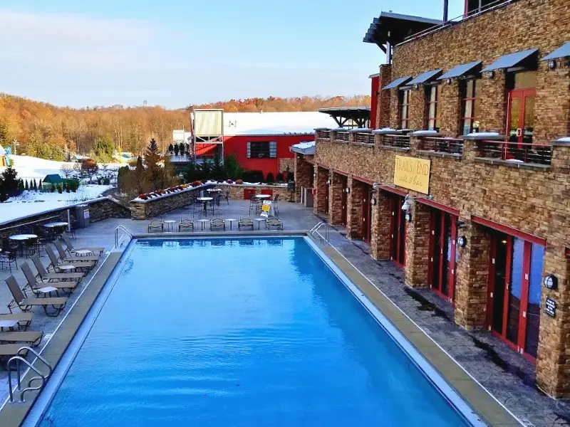 Heated outdoor pool at Bear Creek Mountain Resort in winter.