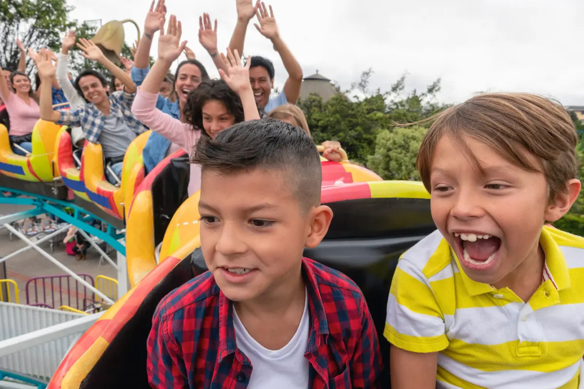 Kids riding a rollercoaster on Memorial Day Weekend