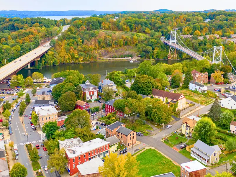 Aerial view of Kingston, New York, and two Hudson River bridges.