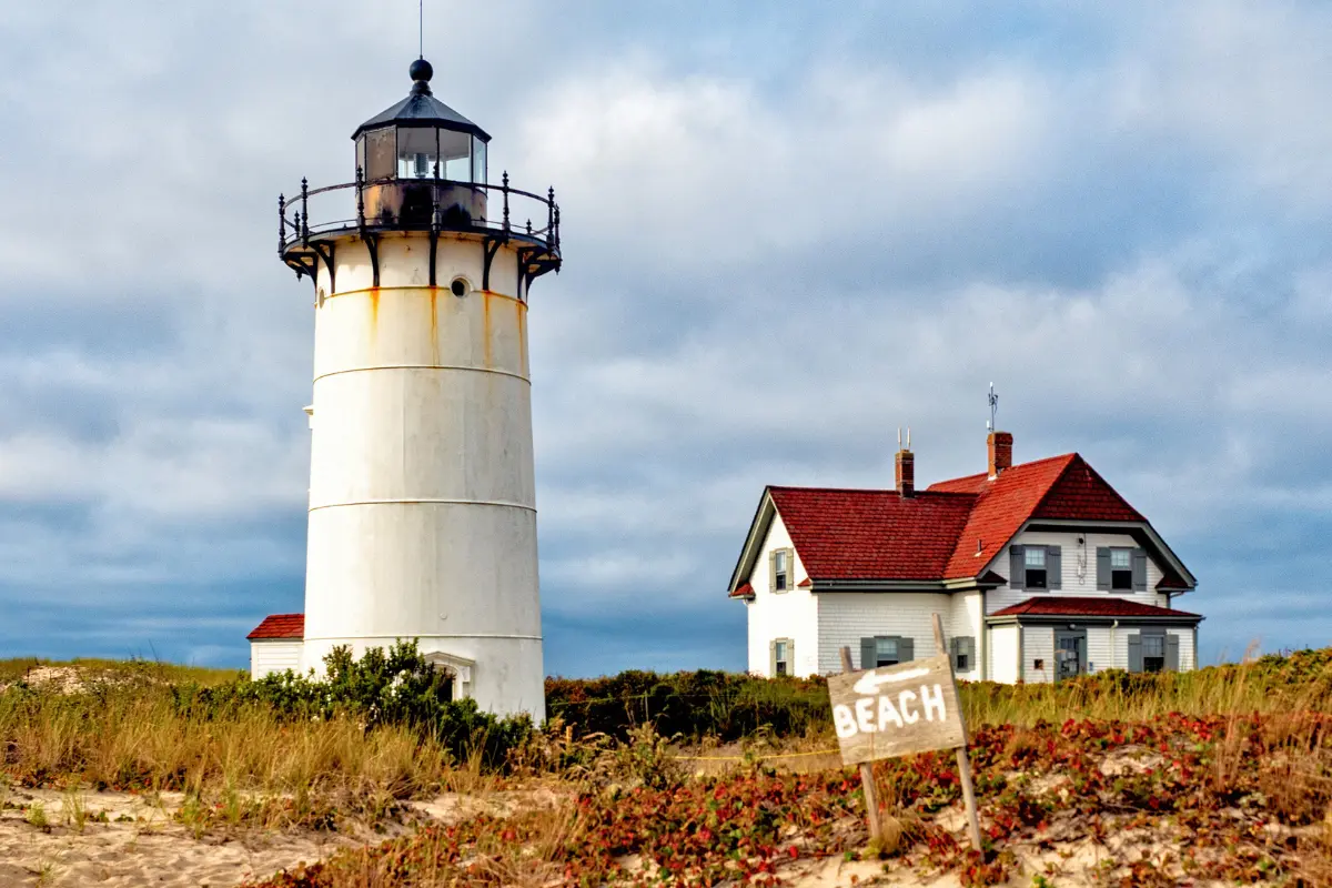 Race Point Lighthouse at sunset on Cape Cod beach