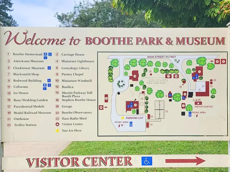 Booth Park & Museum welcome sign with site map and museum buildings listed