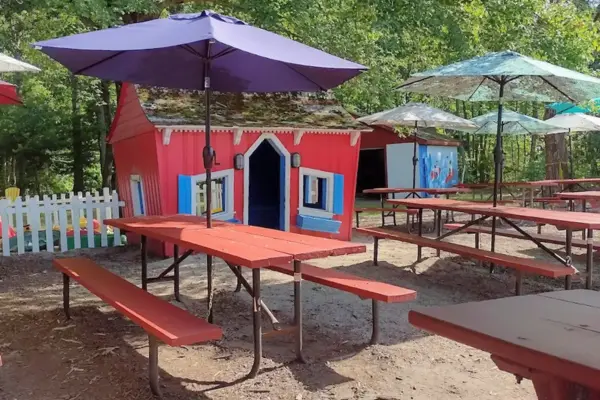 Outdoor playhouses at George’s Surf and Turf in Mendon, a family-friendly restaurant with a playground in Massachusetts
